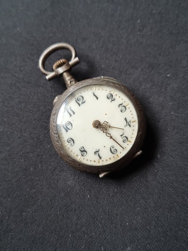 Jolie montre col mécanique - de,