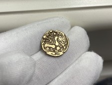 AULERQUES ÉBUROVICES Hémistatère au loup, joue tatouée. Gold Celtic Stater