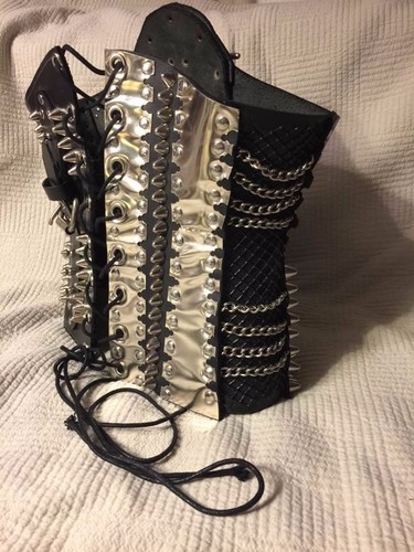 Hand tooled leather and metal