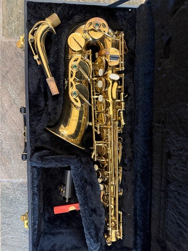 Alto saxophone with case - case, and