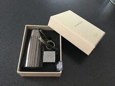 Porte-clés,bijou de sac BURBERRY gris bronze et son gloss neuf