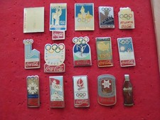 lot de pin's sur le logo Coca Cola et les JO