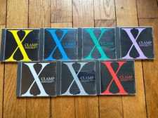 Lot 7 CD X Clamp Character