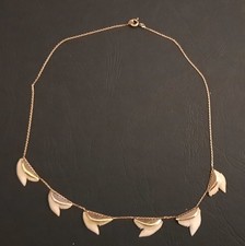 Collier en OR  orné de dents