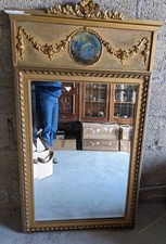 Miroir trumeau Style Louis XVI en bois et stuc doré XIXe S