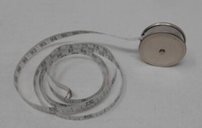 Mètre ruban de couturière ancien en métal - Mercerie vintage