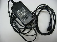 Alimentation 13.5Vdc 1A       Canon K30081 AD-300     IN: 230Vac 135mA  50Hz