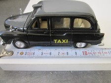 1/43 ? WELLY VOITURE TAXI LONDONIEN AVEC OUVRANTS