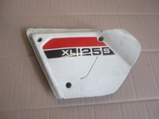 Cache latéral gauche pour