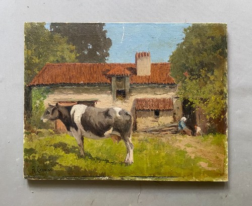 Vache devant une ferme