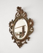 Miroir mural vintage doré