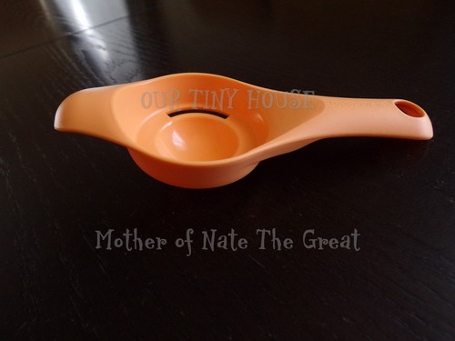 New tupperware egg separator - new,