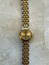 Montre vintage doré et