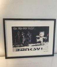 lithographie banksy avec certificat et encadrée 