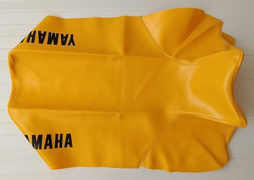 Housse selle jaune orange - -,