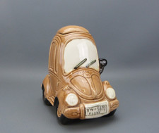 Tirelire en céramique décor de Volkswagen Coccinelle, signé FUJIKA.