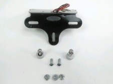 SUPPORT DE PLAQUE ET ECLAIRAGE