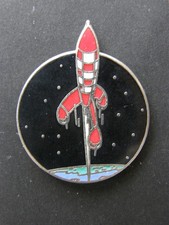pin's TINTIN -fusée- objectif