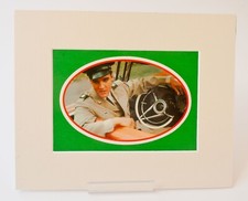 Elvis Presley in Army uniform sitting in his car matted  decal-photograph