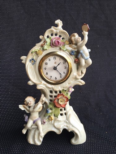 Pendule porcelaine - en,