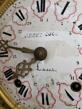 mécanisme horloge ancienne ,portant le nom de l Horloger et la ville LASSay ?