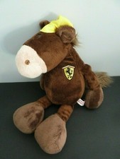82. DOUDOU PELUCHE NICI SPORTS CHEVAL FERRARI MARRON CASQUETTE JAUNE 38c TBE