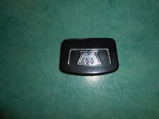 Cache compteur noir Motobécane avec logo "M" argenté neuf ancien stock