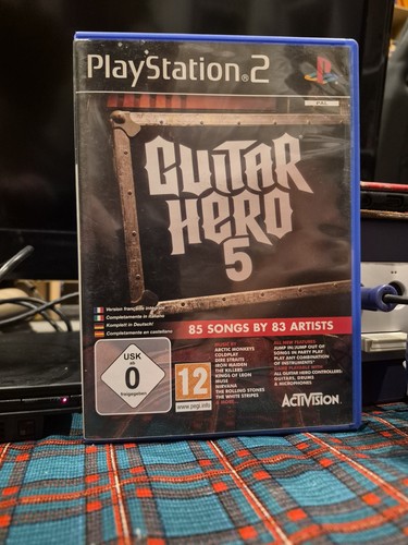 Jeu ps3 guitar - hero, complet