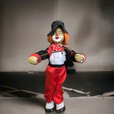 Ancien automate musical clown en porcelaine 