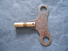 Cle pour jouet - pendule