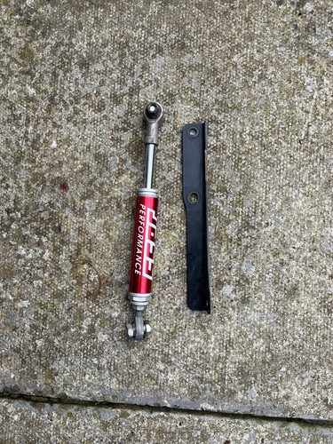 Engine torque damper brace