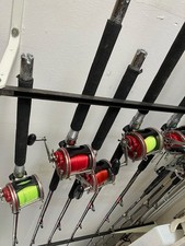 5 Cannes de traine et 5 moulinets PENN 114H