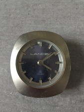 Pendulette Réveil LANCEL en Acier Brossé 7 rubis fond bleu marine à restaurer