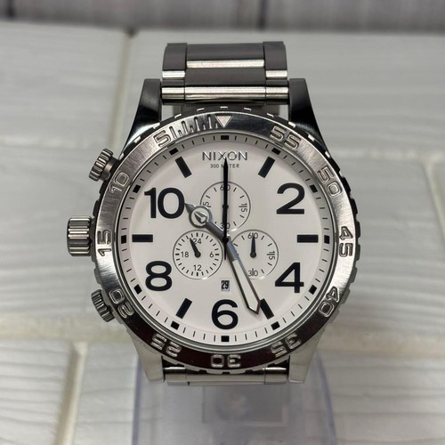 Montre nixon simplify the - montre,