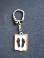 PORTE CLE (KEY RING)METAL  NO AUGIS PIEDS NOIR