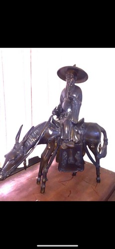 Toba mule fisherman - mule, bronze