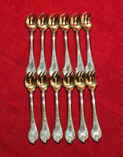 12 fourchettes à huître en argent massif Minerve pièces rocaille feuillages