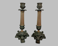 Paire de bougeoirs en régule et laiton à décor de dauphins milieu XIXème