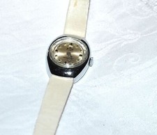 WILSON Montre femme vintage Swiss Made mécanique argenté et bracelet cuir blanc