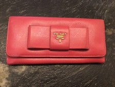 Authentique porte feuille compagnon cuir rose Prada 
