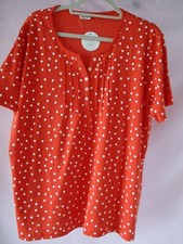 Tee shirt/polo orange imprimé