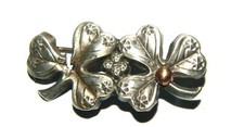 broche  métal début 1900 trèfles