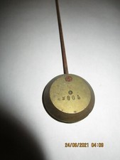 Balancier de pendule ancien