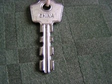Vintage Antique TRAVCO Double Sided Metal Key Word CHINA Engraved on Back 2 7/8"