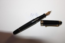 Stylo plume AURORA 8.8 Résine Noire et Or, rayures d'usage, fonctionne