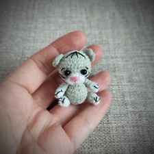 Miniature crochet cat. Miniature toy.