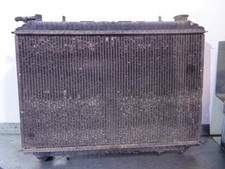 214107C002 radiateur eau pour NISSAN VANETTE CARGO 2.3 DIESEL 1995 4757764