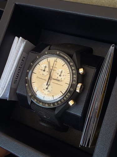 Swatch omega mission - x,