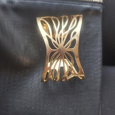 Joli pendentif doré Thierry mugler manchette vintage
