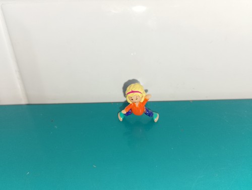 Polly pocket figurine doll